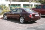    Exotics in Dubai: Maserati Quattroporte - C rear left (maroon)